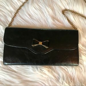 Style & Co faux leather clutch with bow